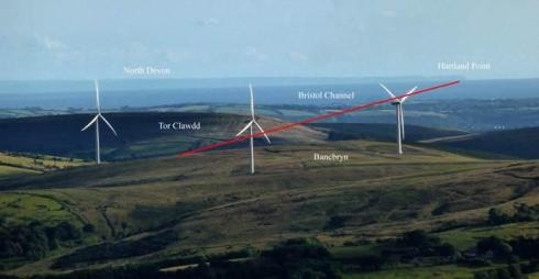 View from the Black Mountain illustrating the wider landscape within which Bancbryn should be viewed. The red line denotes the line of sight between the cairn at the top of the row and Hartland Point.
